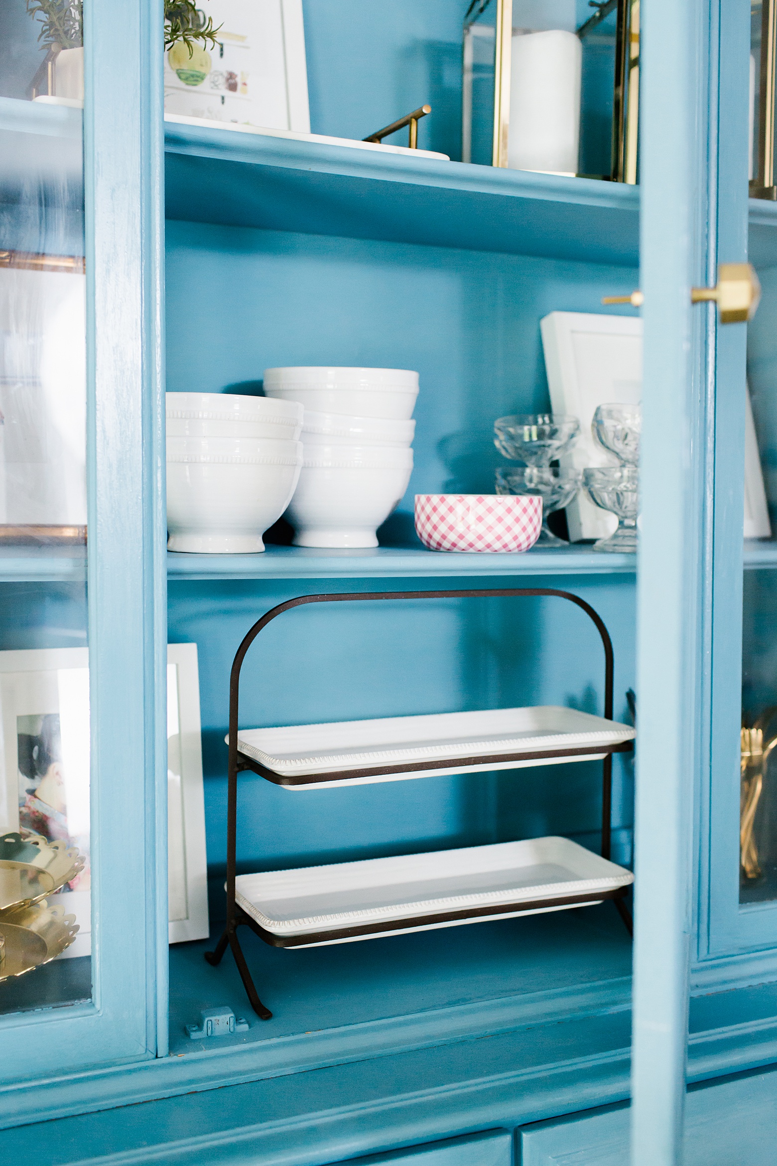 Vintage blue hutch, Pottery Barn white dishware, bright white kitchen on Megan Martin Creative
