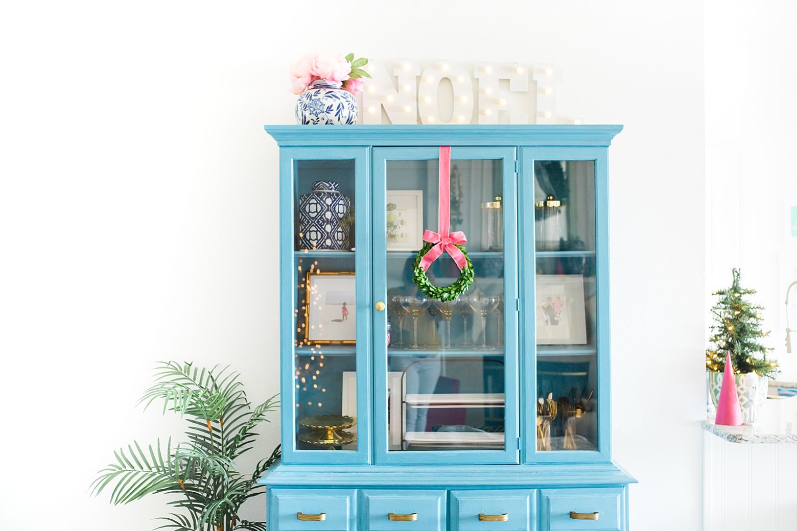 blue hutch decorated for Christmas, colorful christmas home tour